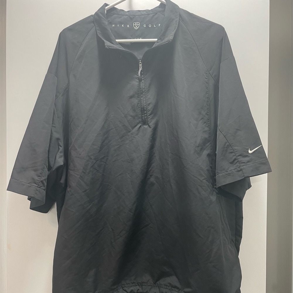 NIKE GOLF SHORT SLEEVE PULLOVER. Quarter zip